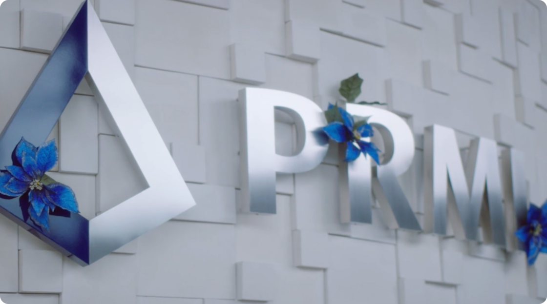 White wall with PRMI logo decor